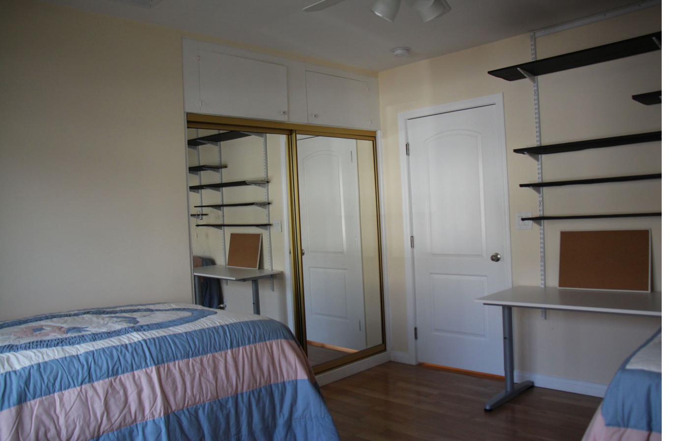 Bedroom mirror sliding closet doors study area Cal State LA housing