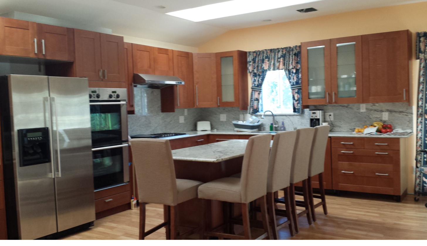 Gourmet kitchen island with granite countertops at CSULA student housing 5476 Bohlig Road